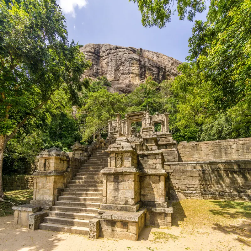 Ancient stone staircase and rock fortress at Yapahuwa, a historic royal capital in Sri Lanka.