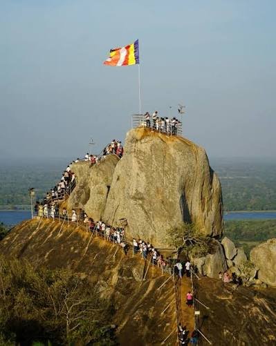 Historic Mihintale Rock Steps surrounded by greenery